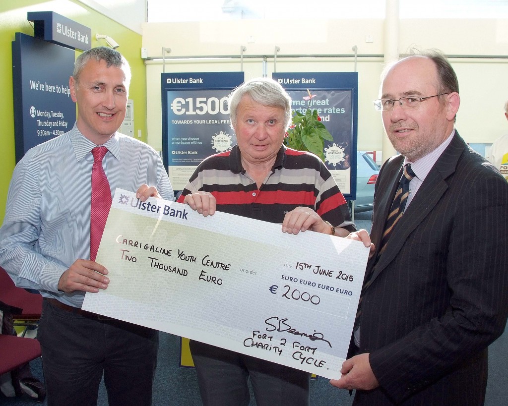 Pictured at the Presentation of cheques from the proceeds of the Fort2Fort Charity Cycle around Cork Harbour, were from left, Padraig Barrett, Fort2Fort Cycle Committee ; Roy Jolly and Colm O'Rourke of the Carrigaline Lions Youth Centre Project. (Picture: Adrian OHerlihy) NO REPRODUCTION FEE  16-6-15